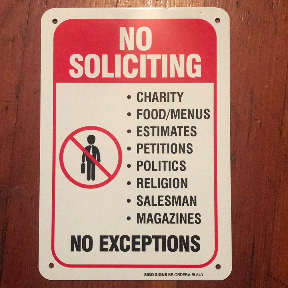 No Soliciting metal sign